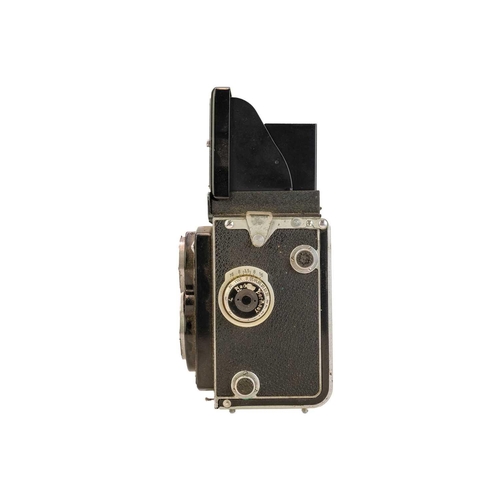 92 - A Rollieflex Compur-Rapid twin reflex camera. No 1063576, with fitted leather case.