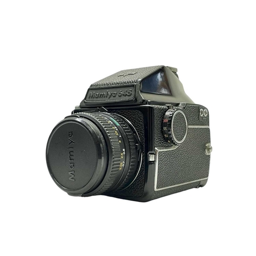 93 - A Mamiya M 645 Prism Finder medium format camera body. Fitted with a Mamiya-Sekor 80mm lens together... 