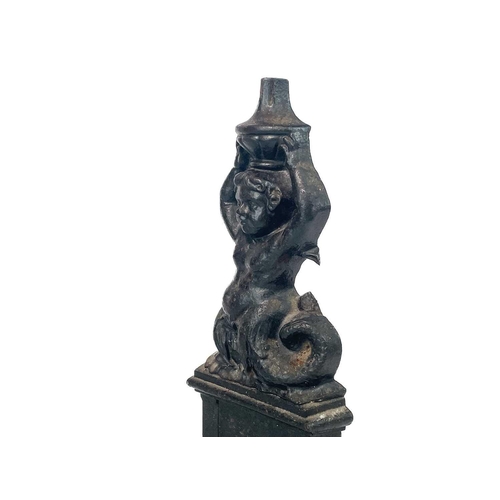 98 - A Coalbrookdale cast iron door stop. Cast as a merman, stamped marks, No1692 and 23, with a design r... 