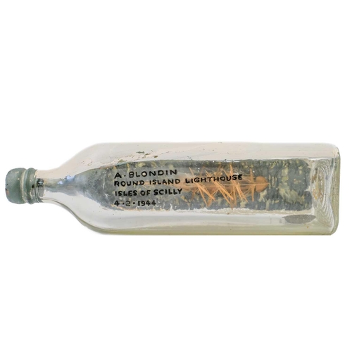 6 - Model ship in a bottle, 1944 Made by A. Blondin, Round Island Lighthouse keeper, dated 4.2.1944 Show... 