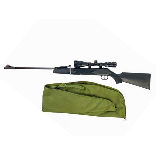 69 - A Sportsmarketing SYNSG 22 calibre air rifle Matte black with Nikon Stirling scope, cover and two ne... 