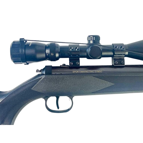 69 - A Sportsmarketing SYNSG 22 calibre air rifle Matte black with Nikon Stirling scope, cover and two ne... 