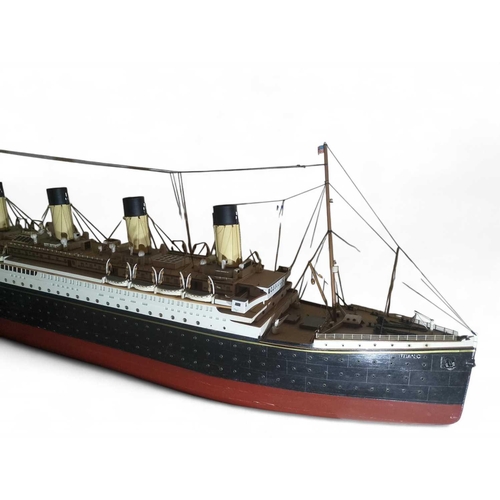 109 - A model of the RMS Titanic A fine reproduction of the world's most famous liner, the decking with fi... 