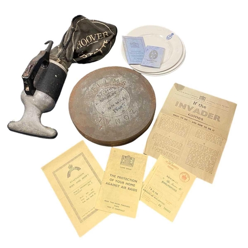 1134 - 'Home Safety' display items 1 x steel film reel case marked ‘Ronal Films’, a Hoover Dustette, Ellen ... 