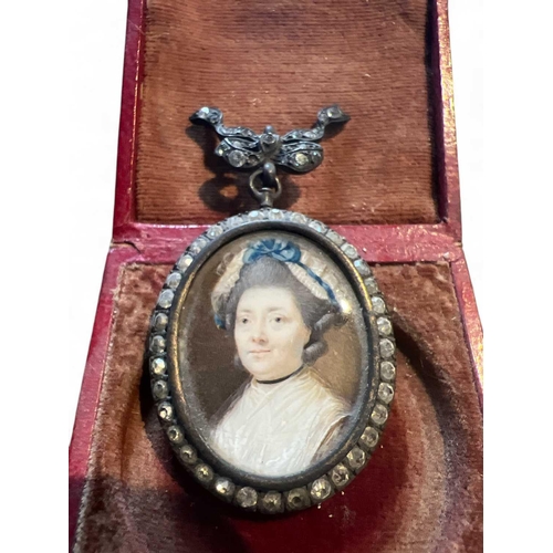 170 - Miniature A fine Georgian portrait miniature of a lady, a blue ribbon in her lace bonnet 3x2.5cm in ... 