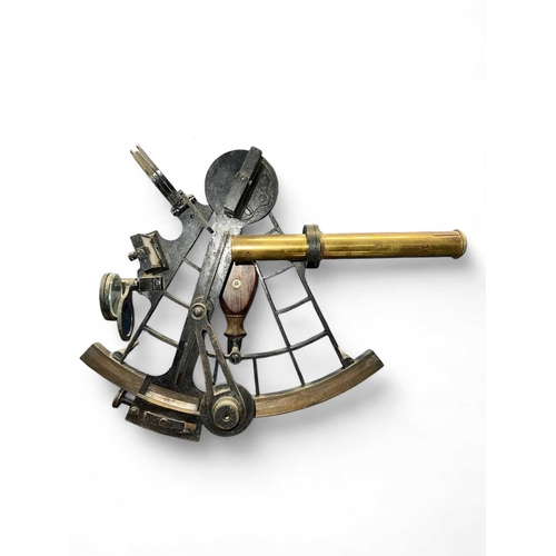 184 - A sextant with inlaid silver scale