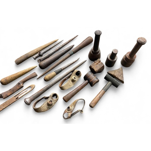 185 - A collection of 19th century sail maker's tools Various wooden fids, marlin spikes, punches etc. Lon... 