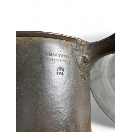 214 - Pewter tableware A Victorian quart tankard (H;15cm), a chamberstick and a plate (23.5cm diameter) wi... 