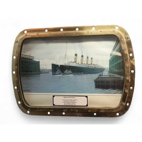 23 - A brass rectangular porthole 65cm x 52cm x 5cm