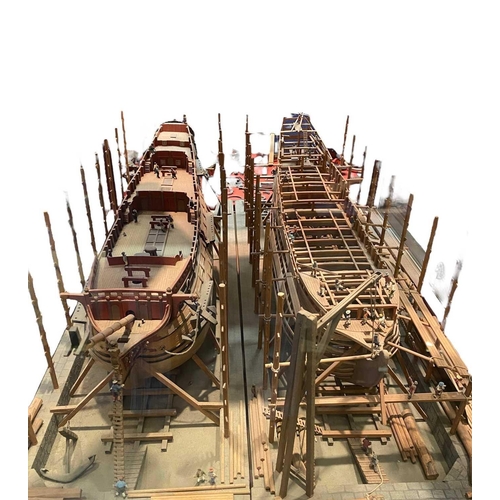 236 - Wooden model of an 17th century naval dockyard Highly detailed and depicting the construction of two... 