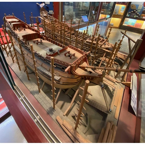 236 - Wooden model of an 17th century naval dockyard Highly detailed and depicting the construction of two... 