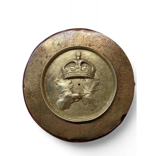 324 - HMS Royal Oak, 1939 A brass tompion mounted onto an oak board Bearing oak leaf and crown emblem, 37c... 