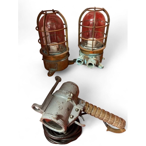 361 - A pair of ships companion way lamps Brass with clear glass shades. Each 21.5cm high. Together with a... 