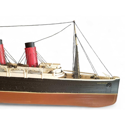 37 - RMS Lusitania A hand-built model of the ship Plastic construction, c1960's, 68cm in length.