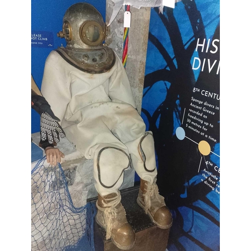 487 - An early deep sea diving suit, ‘Siebe Gorman’ style Together with a brass fully-enclosing helmet wit... 