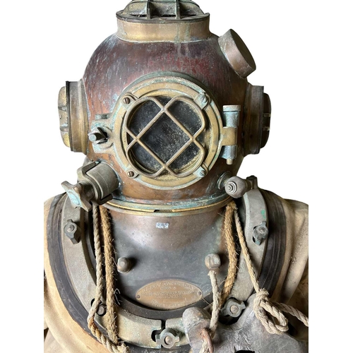 504 - Diving A diving suite with American style 12-bolt helmet, the plate reads US diving Equipment, Mark ... 