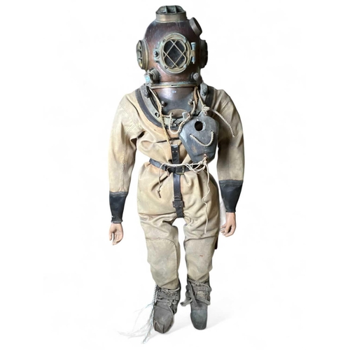 504 - Diving A diving suite with American style 12-bolt helmet, the plate reads US diving Equipment, Mark ... 