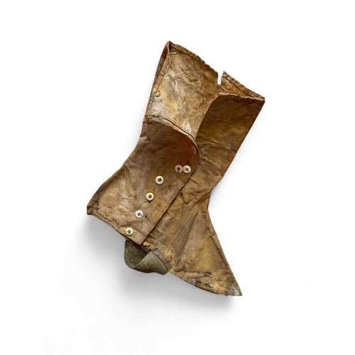 557 - The General Abbatuci - 1869 Military Gaiters A pair of canvas, button-up military gaiters. Length 29... 