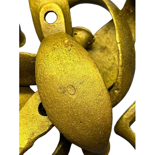 562 - Santo Andre, Cape Verde 1856 A collection of brass trigger guards most marked 'M' together with vari... 