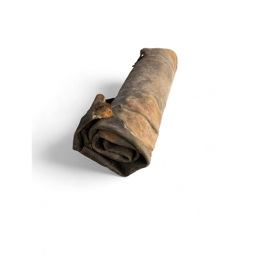 620 - The Royal Charter, 1859, Anglesey Fire hose nozzle Together with a rolled hide. Length of hose 41cm,... 