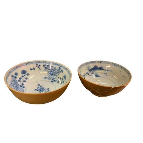 662 - The Nanking cargo and the shipwreck of the Geldermalsen. Two Chinese blue and white porcelain cafe a... 