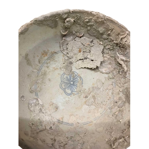 669 - A Chinese blue and white bowl, Ming Dynasty. Some concretion and marine growth, height 7.5cm, diamet... 