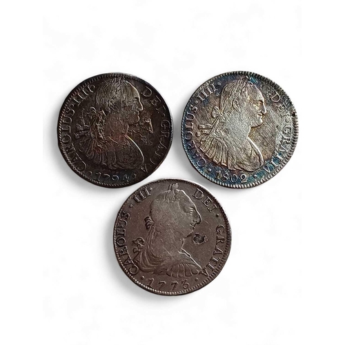 682 - H.M.S. 'Athenienne' 1806. A collection of three 8 reales pillar dollar wreck coins. Including 1794, ... 