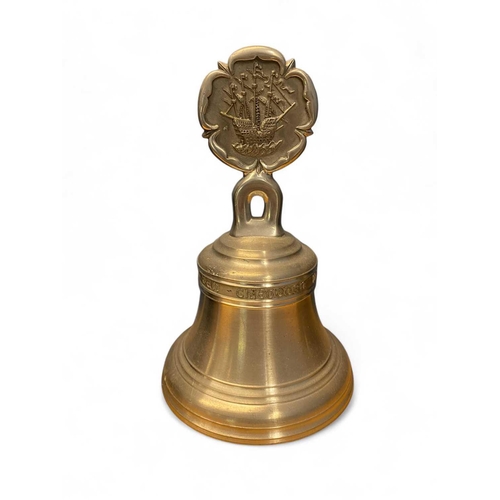 721 - The Mary Rose, wrecked 1545 Replica pewter plate & dinner bell 22cm diameter, bell made by Mary Rose... 