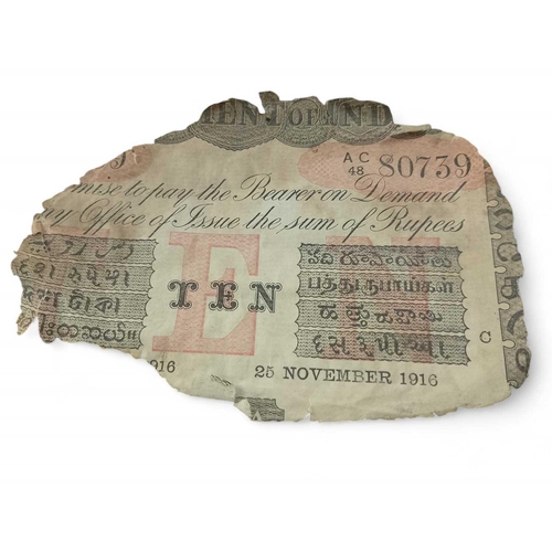 731 - SS. Camberwell, Isle of Wight, 1917 Five ten rupee note fragments, together with pre-paid Indian pos... 