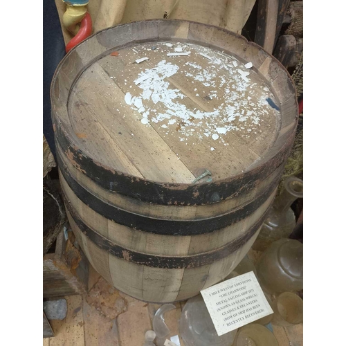 775 - A Wooden Barrel wooden barrel with six copper hoops, very good condition, approximately 62cm x 32cm.