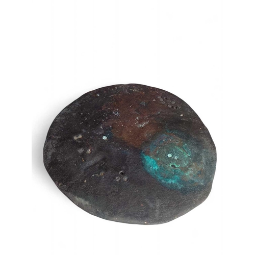 777 - A 19.5lb copper dome ingot from the ‘Rill Ship’ wreck, 1618 Approximately 17cm x 7cm.