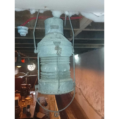 827 - Two twin-handled ship's lanterns Used in The Museum's Shackleton Exhibition Body 52cm in length.