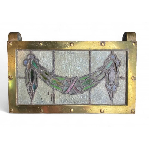 87 - A brass framed stained glass window ventilation light Of very heavy construction, top hung, one hing... 