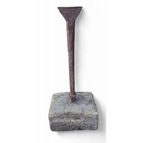 914 - The Charlestown Heritage Collection A Blacksmith’s tall iron stake Mounted in a wooden block, full h... 