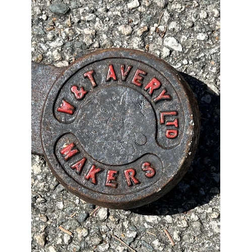 915 - Charlestown Heritage Collection A wrought iron wheel shoe brake, an Avery steelyard, two iron wheels... 