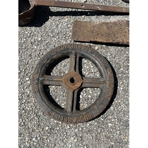 915 - Charlestown Heritage Collection A wrought iron wheel shoe brake, an Avery steelyard, two iron wheels... 