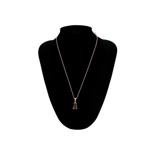 101 - A 9ct gold fancy link chain with 14ct gold smoky quartz pendant. The pendant stamped 14K, length 25m... 