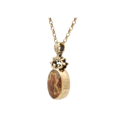 107 - A modern 9ct double-sided agate set pendant, on a 9ct belcher 20