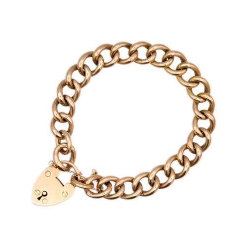 11 - A 9ct rose gold hollow curb link bracelet with padlock clasp. The links and padlock stamped 9ct, 17.... 