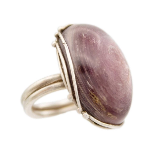 110 - HELEN FEILER - Two silver semi-precious stone set rings. One set with a large lepidolite, size O 1/2... 