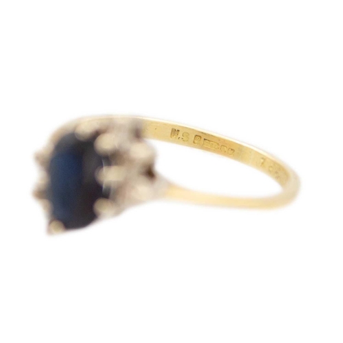 139 - An 18k gold dark blue sapphire and diamonds ring and 9k gold band ring Hallmarked import Birmingham ... 