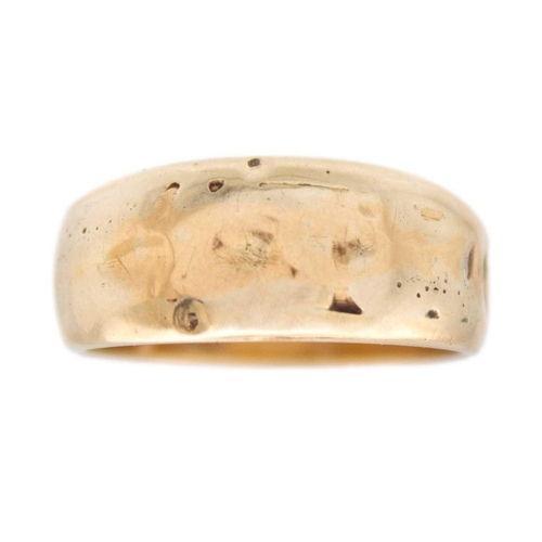 158 - A high purity gold (tests 14ct) band ring The ring is in size P, 4.66g in weight.