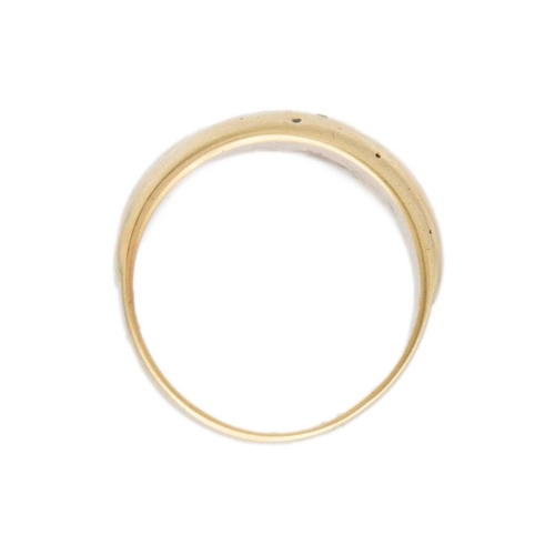 158 - A high purity gold (tests 14ct) band ring The ring is in size P, 4.66g in weight.