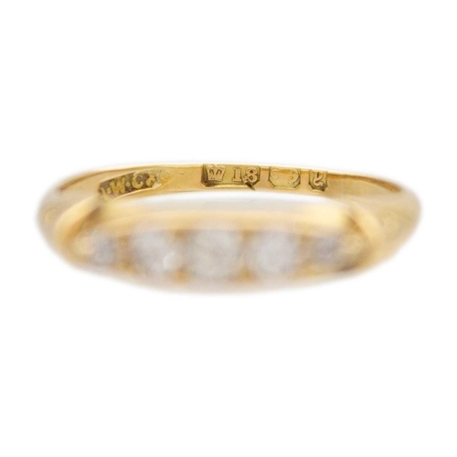 166 - A Victorian 18ct gold boat shape five diamond ring The principal stone is 0.07ct approx.,the ring is... 