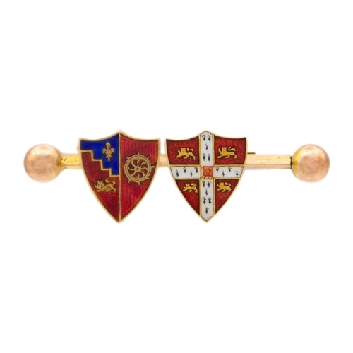 167 - A 9ct armorial enamel shield applied bar brooch and a small 9ct enamel St Christopher pendant. The b... 