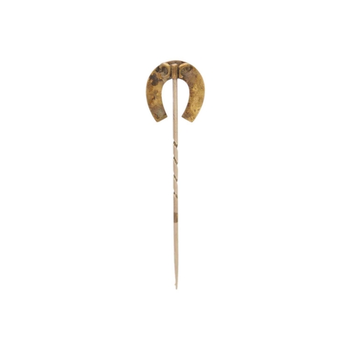 169 - Two 9ct (tested) stick pins. One with a horseshoe finial, length 7cm; the other a knot design, lengt... 