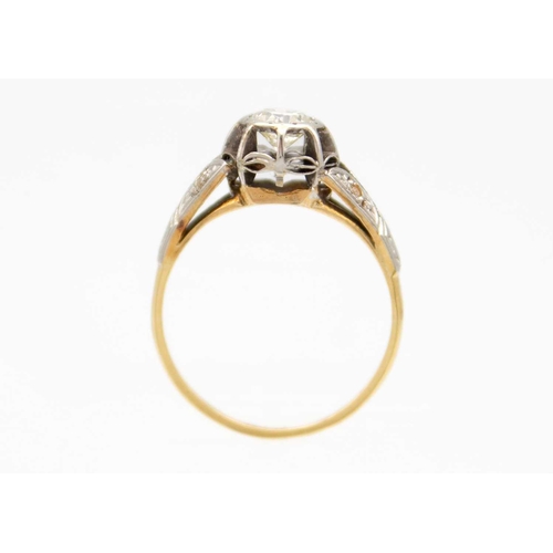 173 - An 18ct yellow and white gold 0.45ct (estimated) diamond solitaire ring. The earlier round brilliant... 