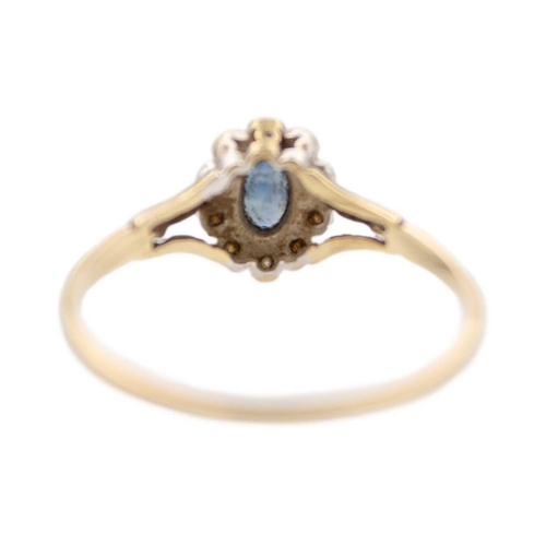 218 - A 9ct yellow gold blue sapphire and diamonds cluster ring The ring has lovely cornflower blue sapphi... 