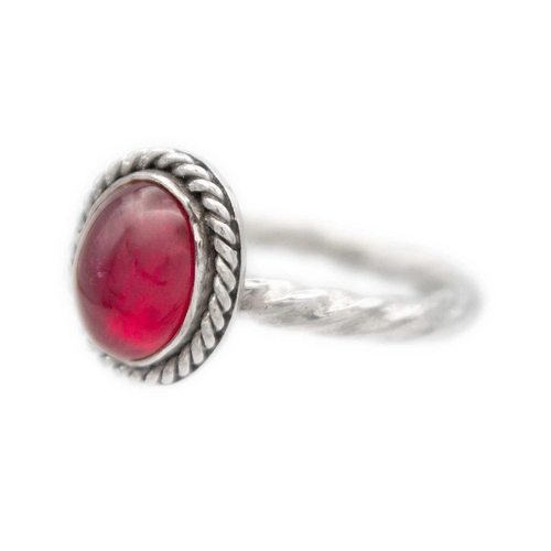 227 - A 5.5ct cabochon ruby set in .999 pure platinum, hand crafted by James Suddaby. Of an original early... 