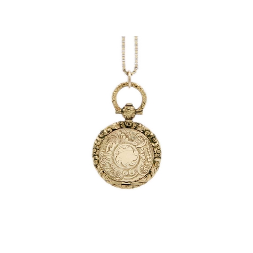 249 - A 19th century gold mourning locket pendant. With foliate embossed and chased edge, with memorial en... 